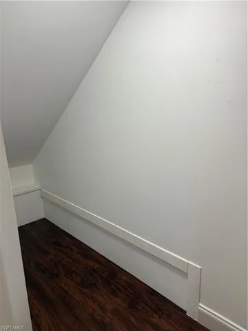 a view of cabinets and window