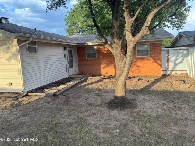 a view of outdoor space and yard