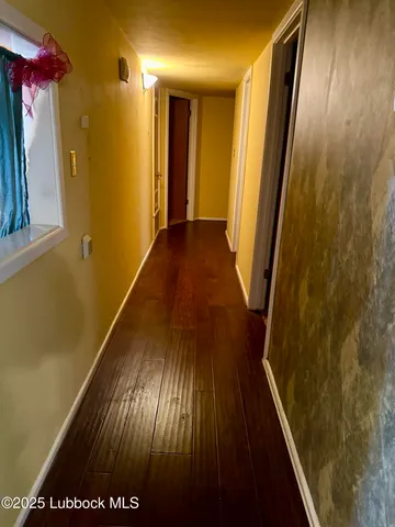 a view of hallway with stairs