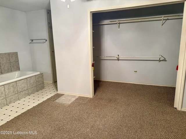 a view of a room with racks on the wall