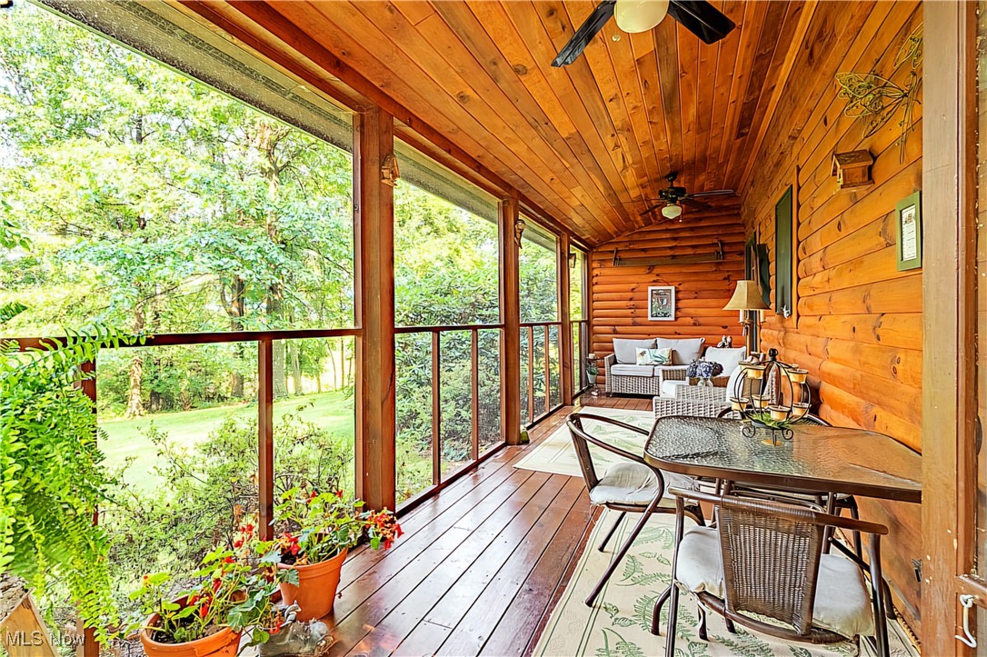 49144 Hickman Road Calcutta, OH 43920 - Photo 20 of 23 Sunroom featuring lofted ceiling, and ceiling fan