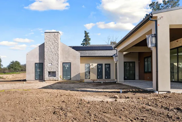 a view of a house with a porch