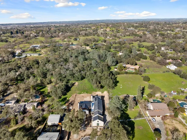 an aerial view of residential building with outdoor space