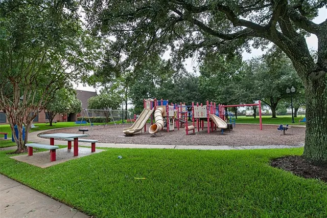 a view of a park with slide