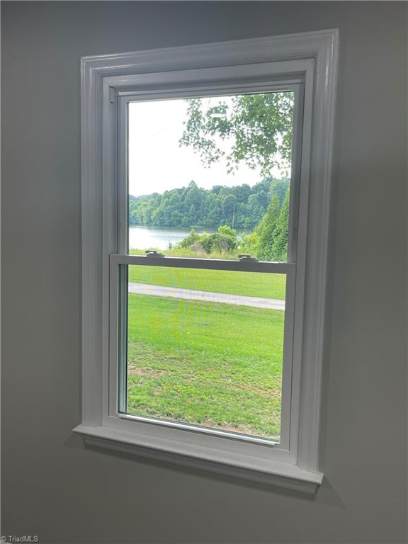 9051 River Mill Road Randleman, NC 27317 - Photo 27 of 34 Primary bedroom, lake view