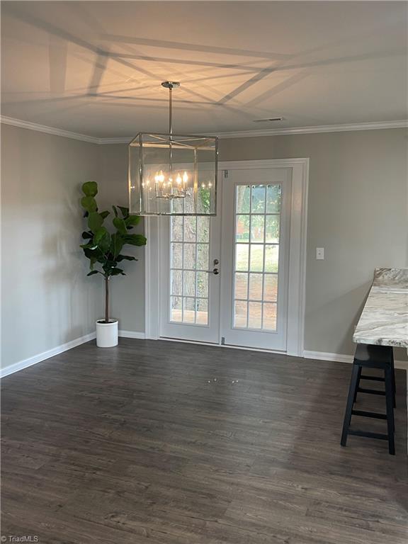 9051 River Mill Road Randleman, NC 27317 - Photo 28 of 34 Dining room with large Pottery Barn light fixture