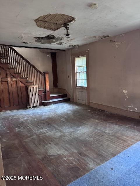 14 Slocum Place Long Branch, NJ 07740 - Photo 5 of 12 a view of an empty room with wooden floor and a window
