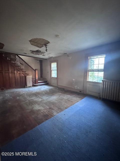 14 Slocum Place Long Branch, NJ 07740 - Photo 6 of 12 an empty room with windows and entrance