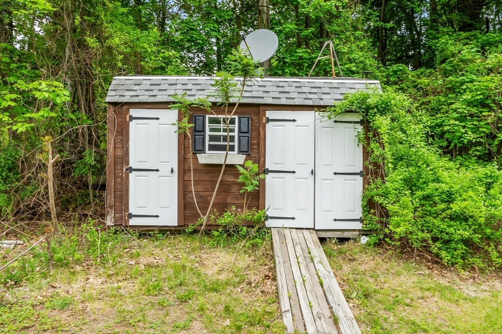 258 Allen Road Ashby, MA 01431 - Photo 33 of 36 a view of a house with backyard