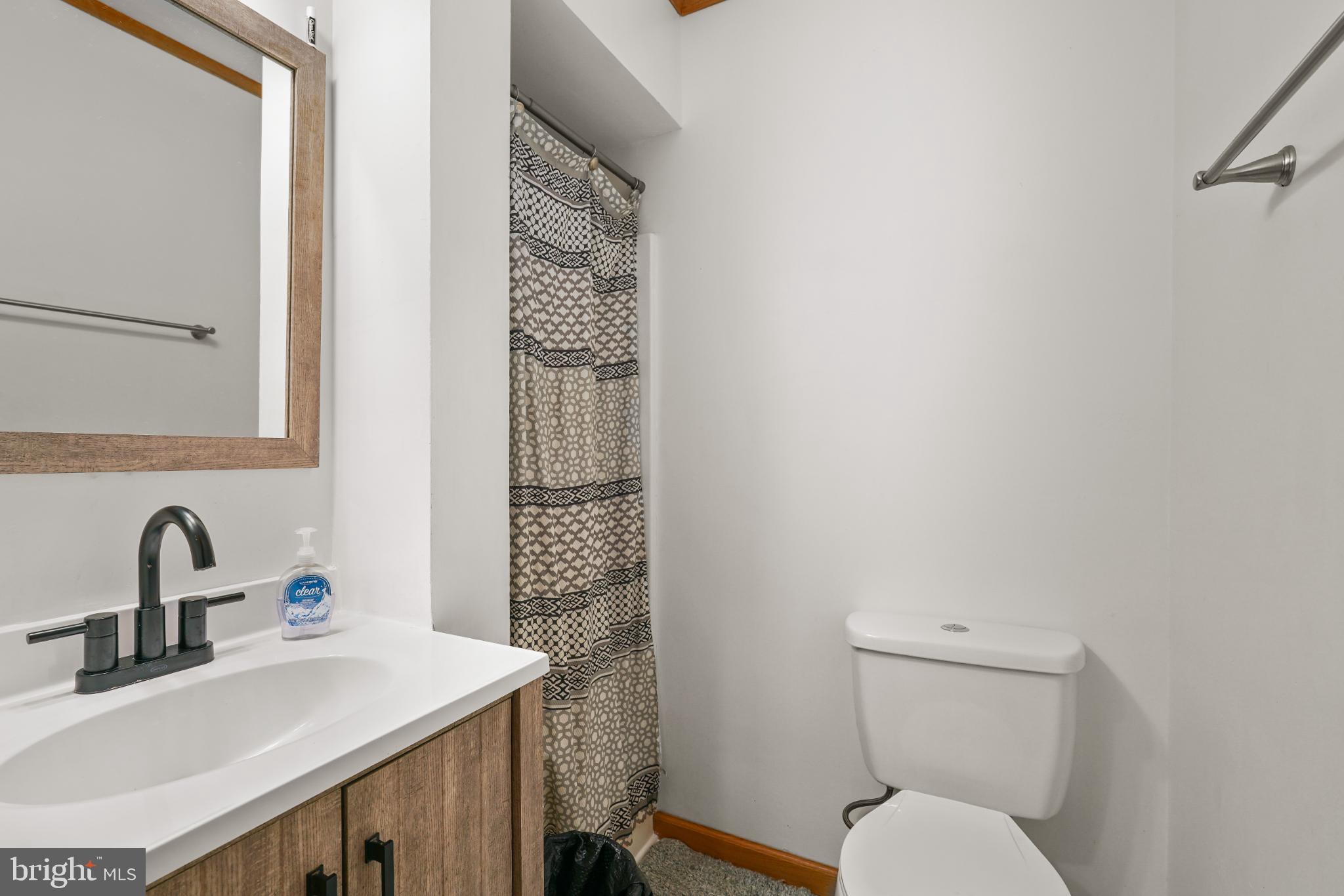 89 Codjus Drive Rising Sun, MD 21911 - Photo 11 of 20 a bathroom with a toilet sink and mirror