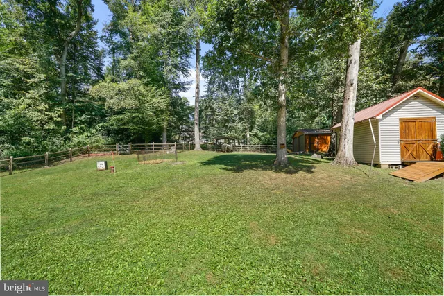 a backyard of a house with entertaining space