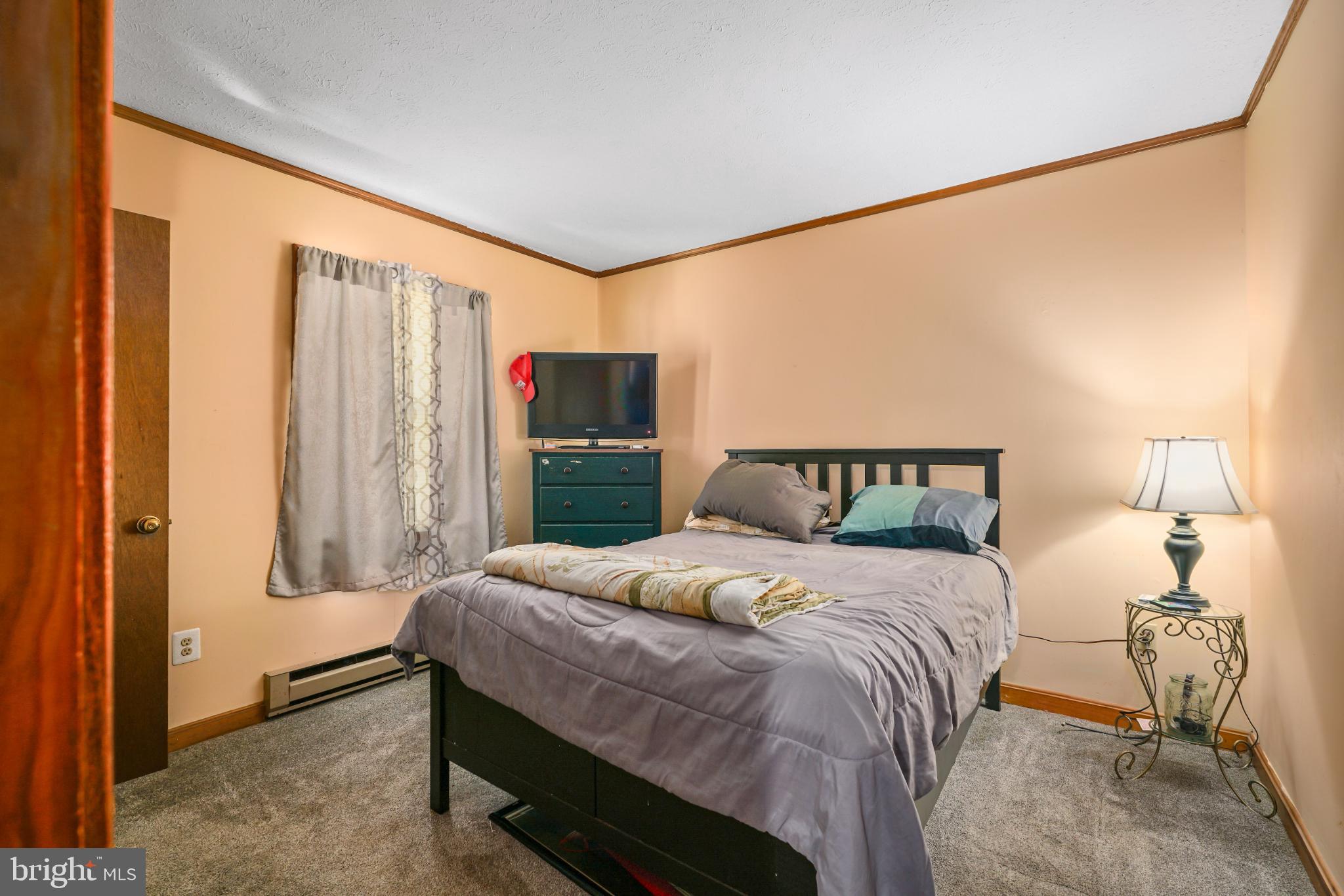 89 Codjus Drive Rising Sun, MD 21911 - Photo 10 of 20 a bedroom with a bed and a window