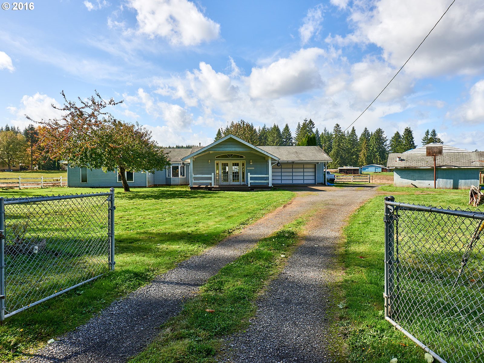 26737 South Look Road Colton, OR 97017 - Photo 2 of 25 a view of an house with backyard and garden