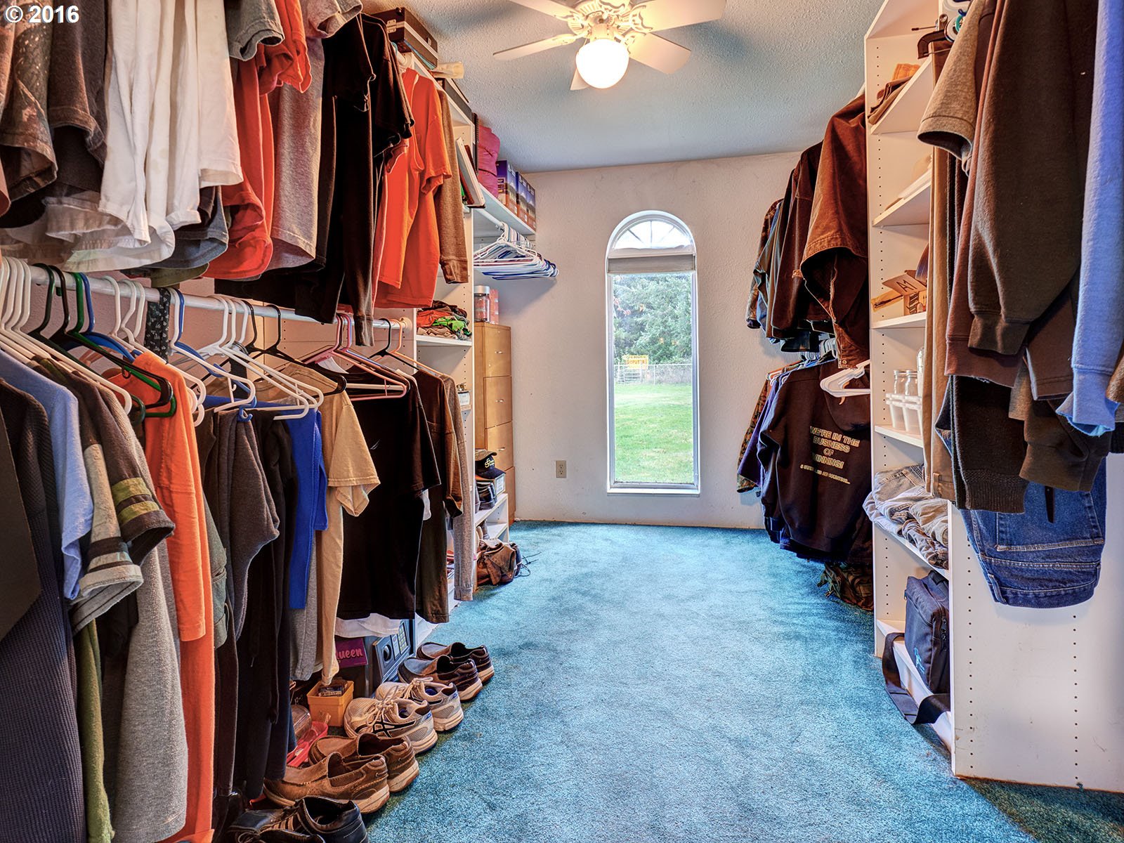 26737 South Look Road Colton, OR 97017 - Photo 23 of 25 a view of walk in closet with clothes and shoes