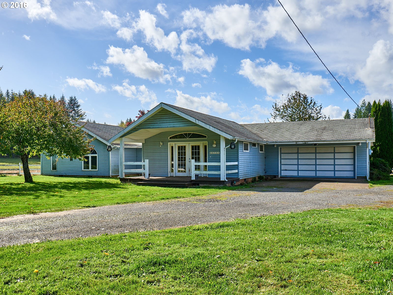26737 South Look Road Colton, OR 97017 - Photo 3 of 25 a front view of a house with a yard
