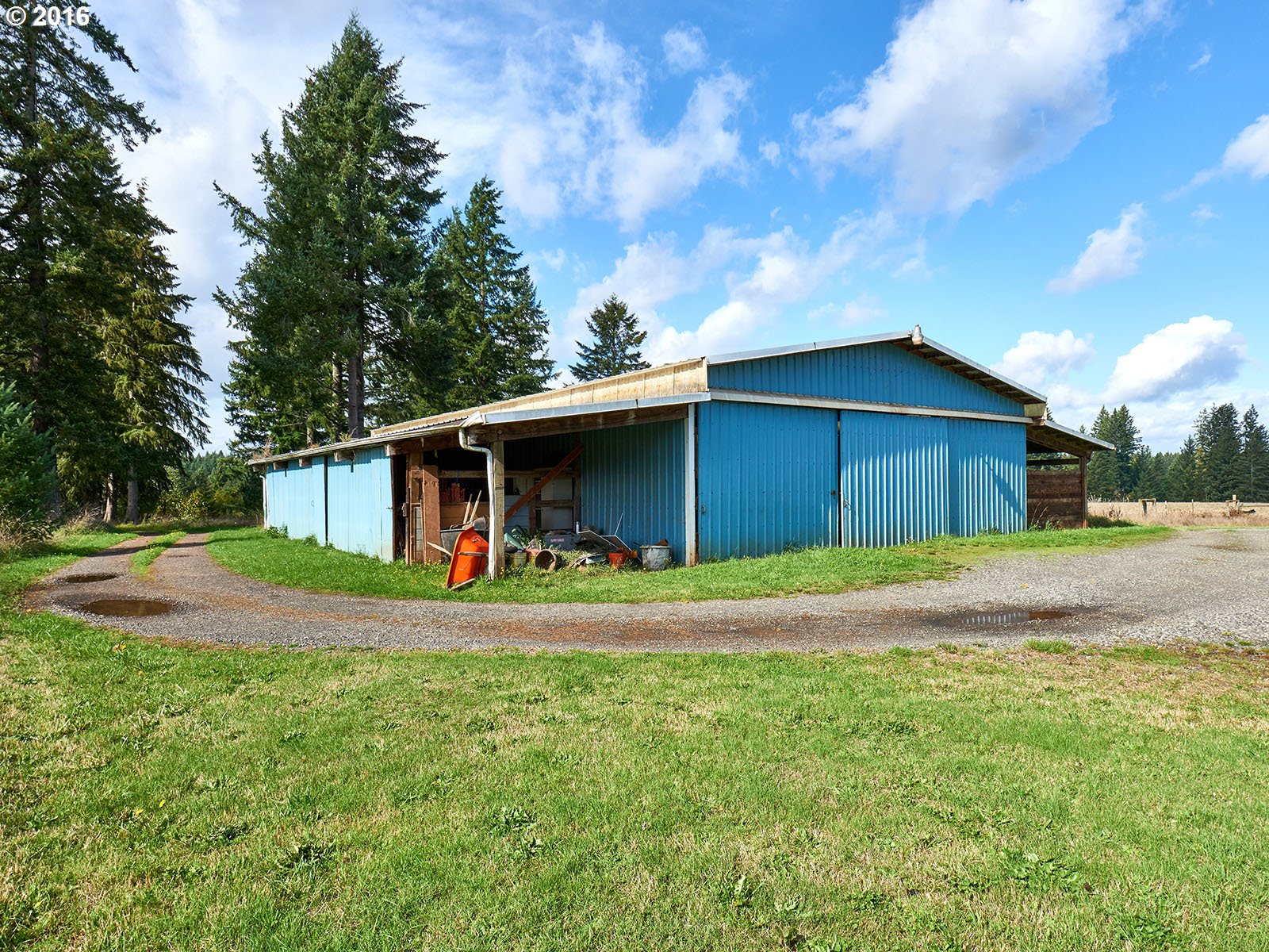 26737 South Look Road Colton, OR 97017 - Photo 9 of 25 a view of backyard of house with wooden fence and trees