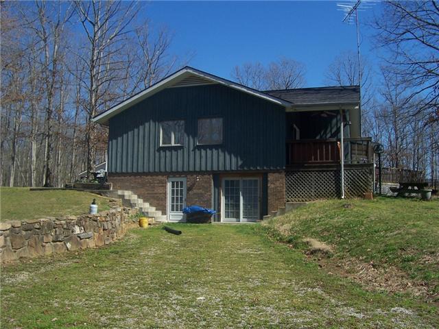 871 Mayne Trace Road Waverly, TN 37185 - Photo 19 of 20 side view of home with entrance to basement