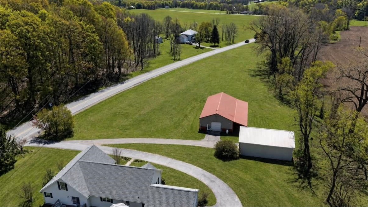 8628 Garlinghouse Road Naples, NY 14512 - Photo 2 of 48 AI used to show yard potential with green grass.