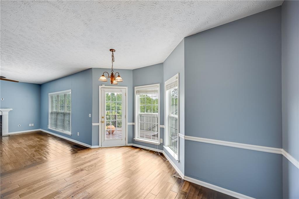 3903 Walnut Grove Way Gainesville, GA 30506 - Photo 22 of 48 a view of an empty room with glass door and balcony