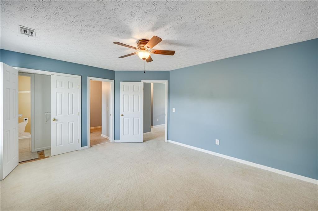 3903 Walnut Grove Way Gainesville, GA 30506 - Photo 31 of 48 a view of an empty room with a window
