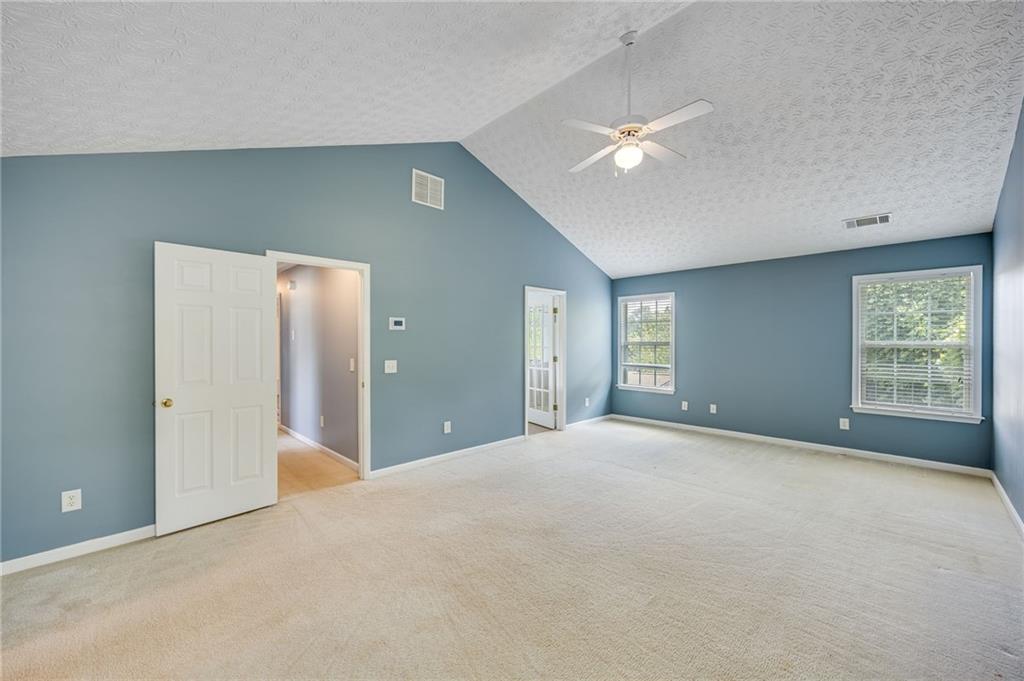 3903 Walnut Grove Way Gainesville, GA 30506 - Photo 40 of 48 a view of an empty room with a window