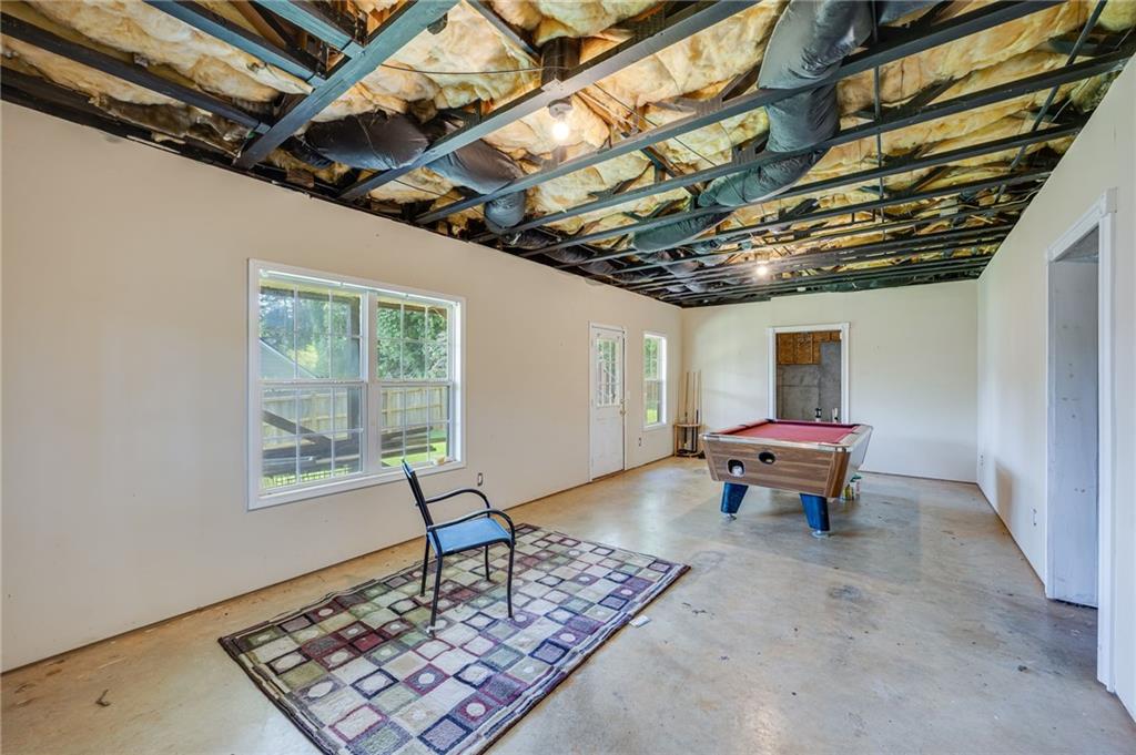 3903 Walnut Grove Way Gainesville, GA 30506 - Photo 46 of 48 a living room with furniture and a window