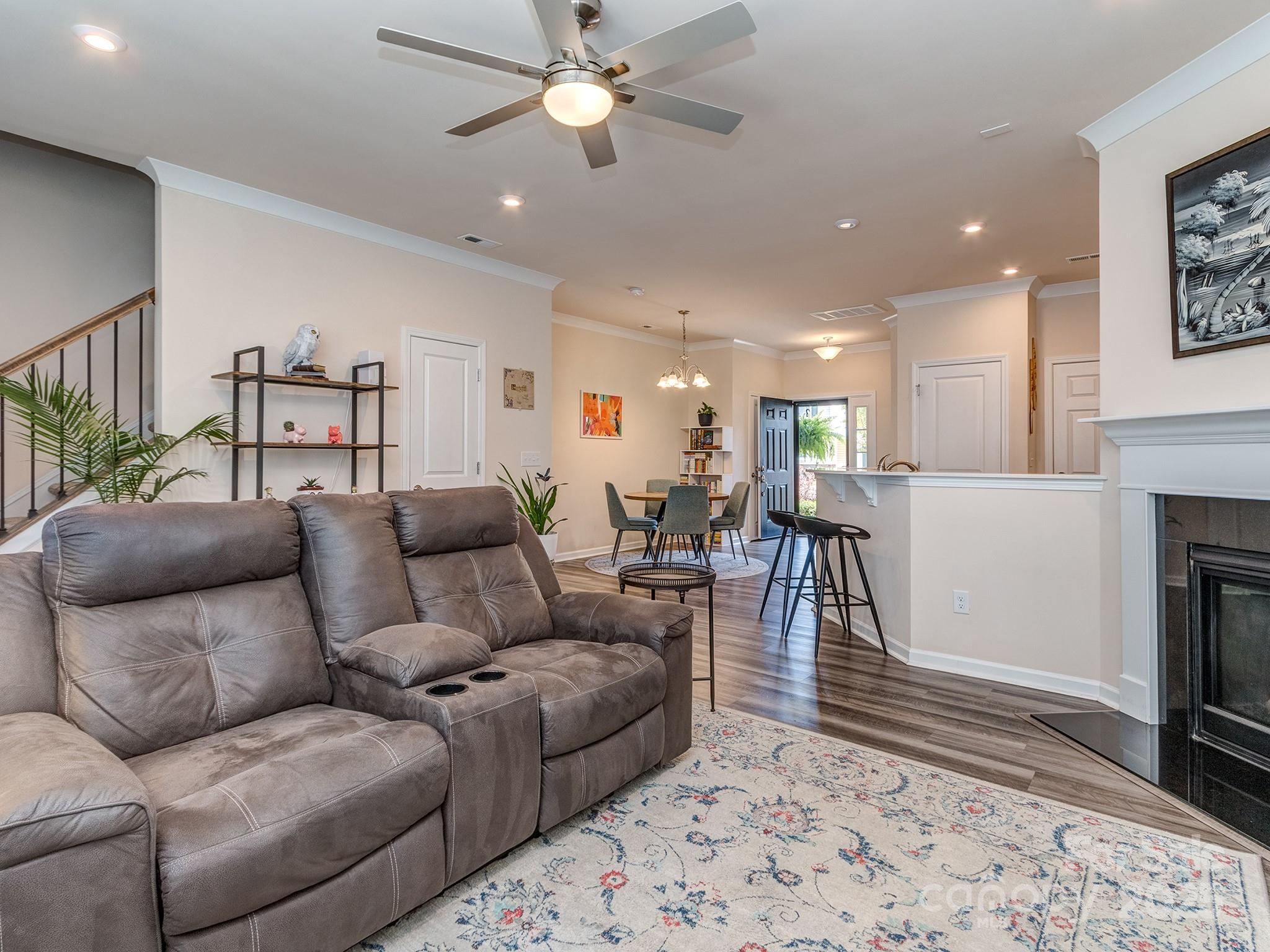 739 Elders Story Road Fort Mill, SC 29708 - Photo 13 of 30 a living room with furniture and a fireplace