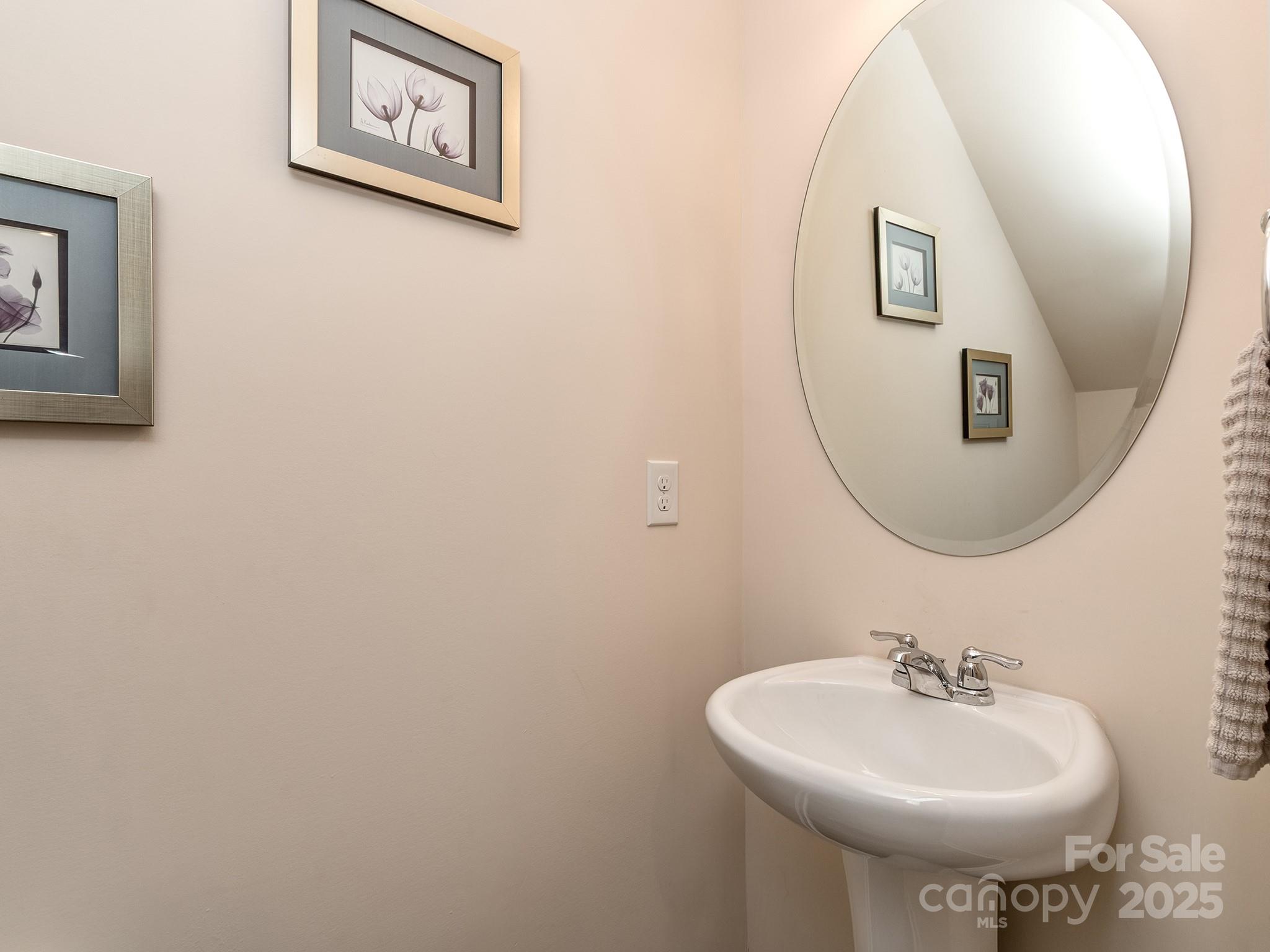 739 Elders Story Road Fort Mill, SC 29708 - Photo 14 of 30 a bathroom with a sink and mirror
