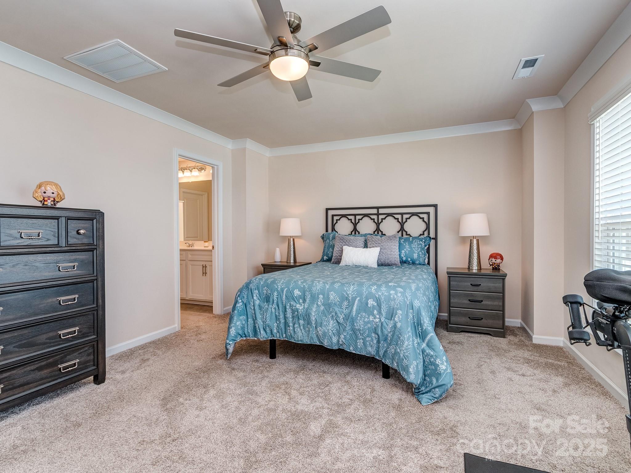 739 Elders Story Road Fort Mill, SC 29708 - Photo 15 of 30 a bedroom with a bed and a tv