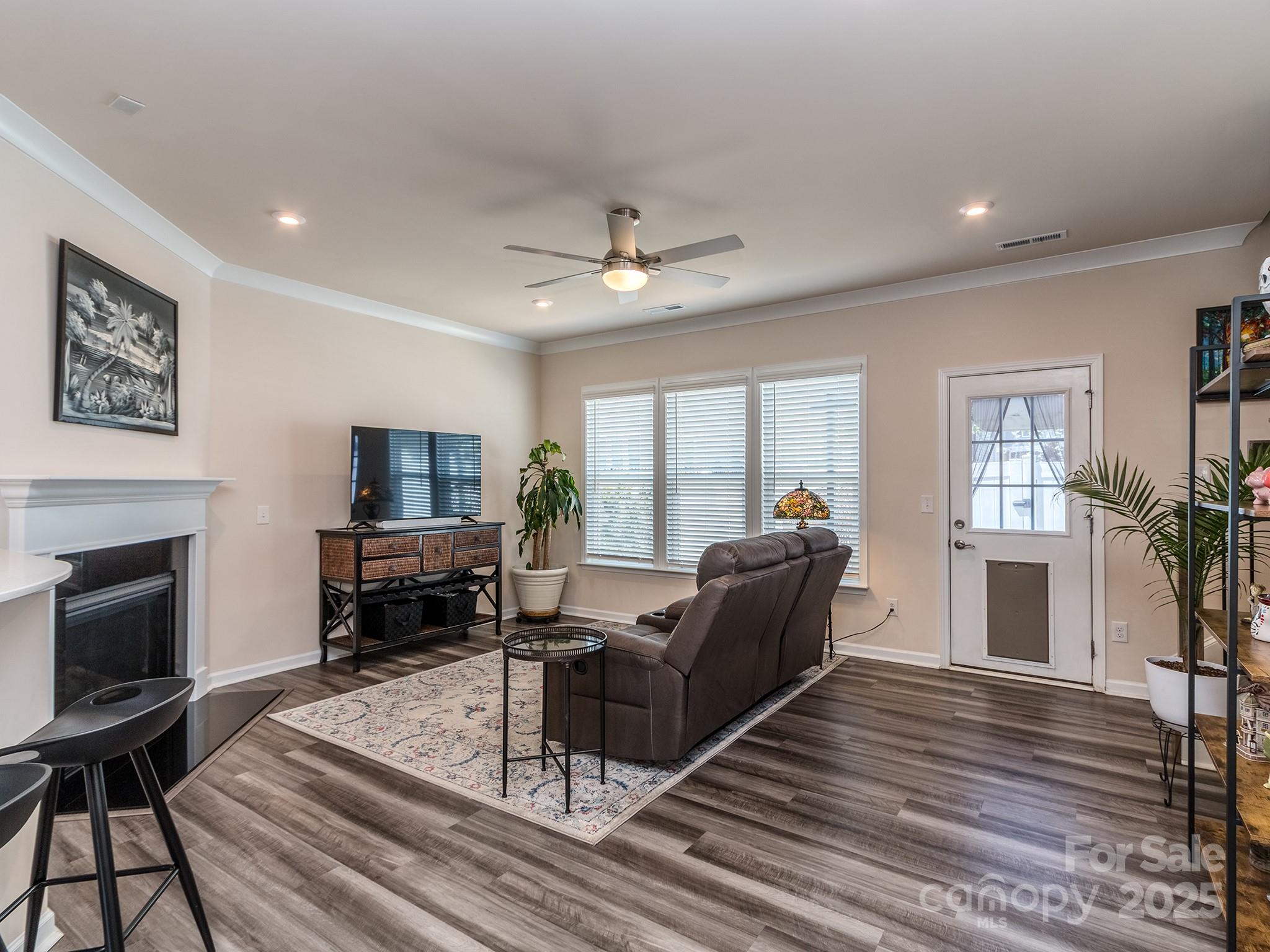 739 Elders Story Road Fort Mill, SC 29708 - Photo 5 of 30 a living room with furniture fireplace and flat screen tv