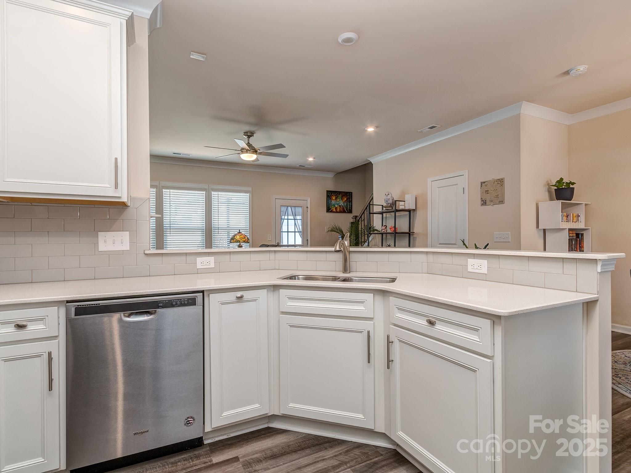 739 Elders Story Road Fort Mill, SC 29708 - Photo 9 of 30 a kitchen with sink stove and cabinets