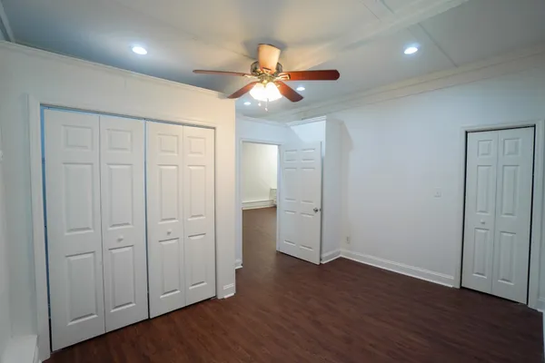 a bathroom with a toilet and a bathtub