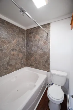 a kitchen with appliances cabinets and a sink