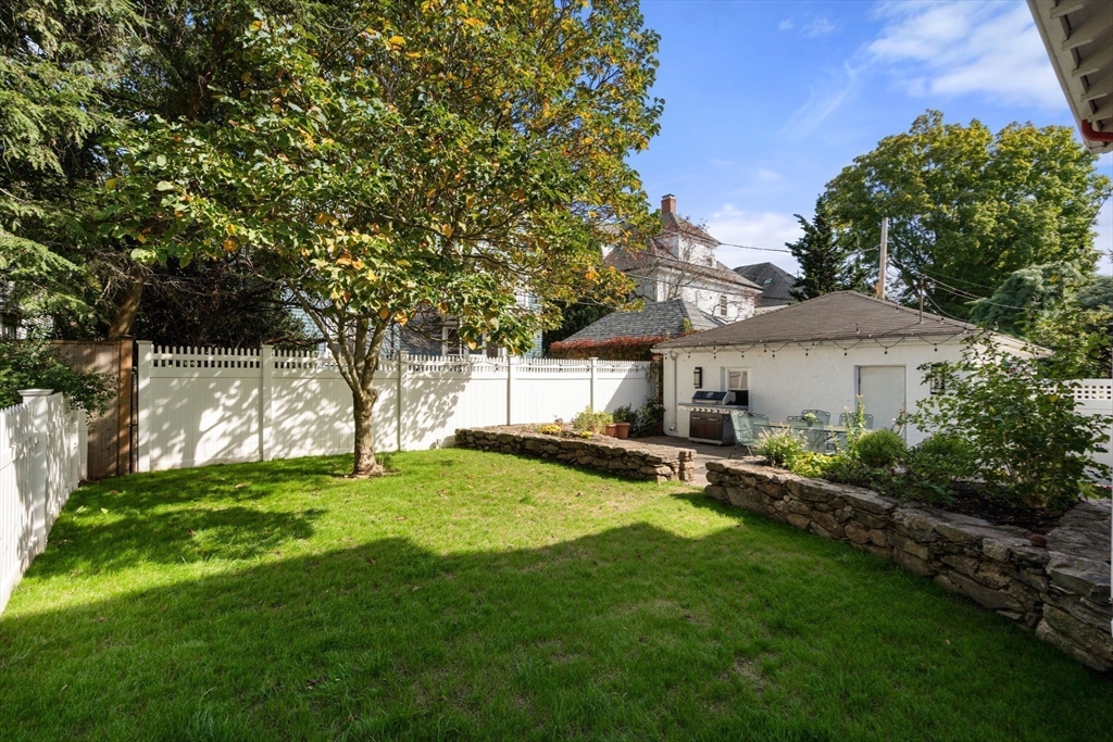 54 Arborway Boston, MA 02130 - Photo 27 of 29 a view of a house with backyard and sitting area