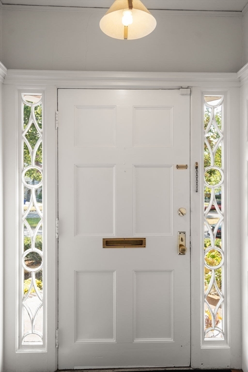 54 Arborway Boston, MA 02130 - Photo 28 of 29 a bathroom with a window and a shower