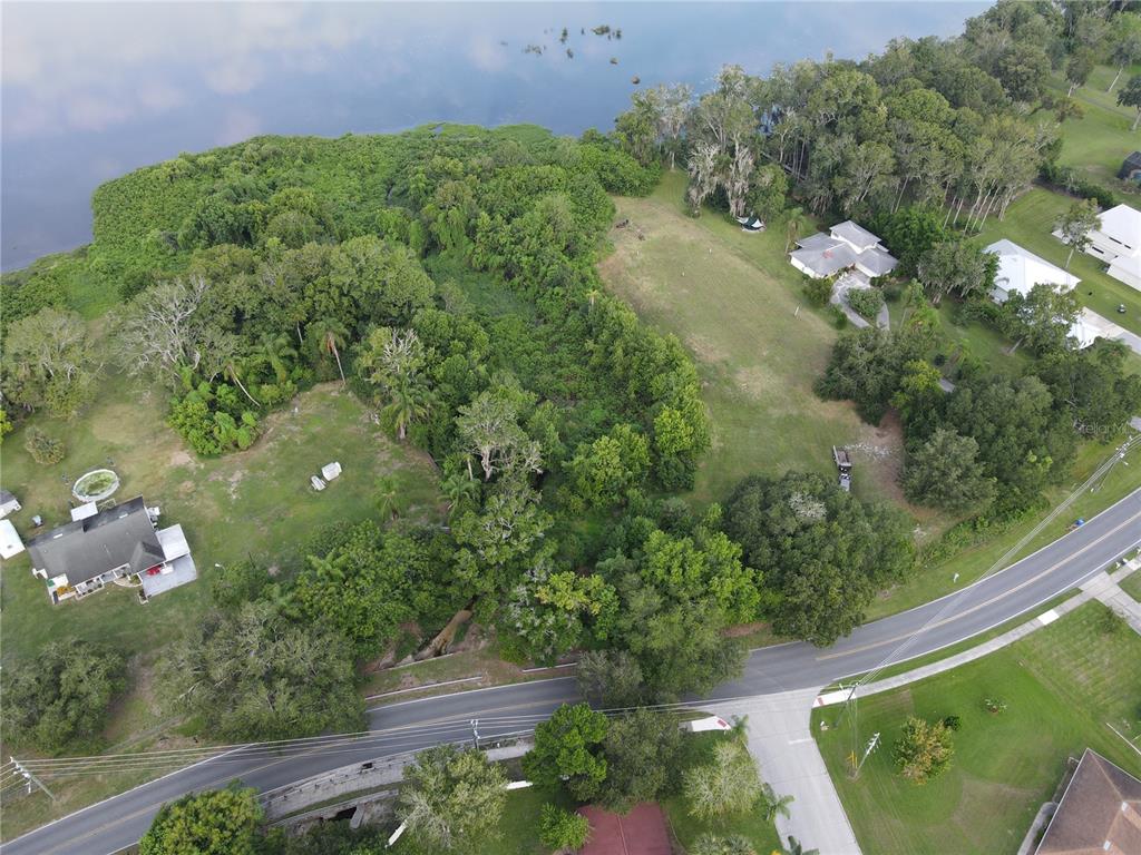 1401 North Fullers Cross Road Winter Garden, FL 34787 - Photo 5 of 10 a backyard of a house with lots of green space