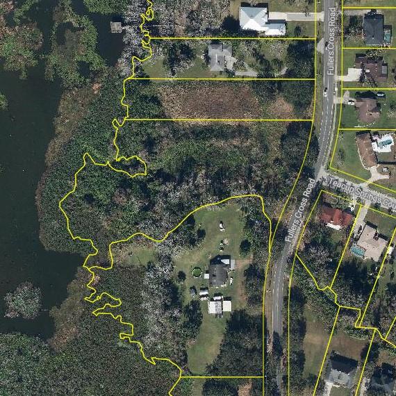 1401 North Fullers Cross Road Winter Garden, FL 34787 - Photo 8 of 10 an aerial view of a houses with yard