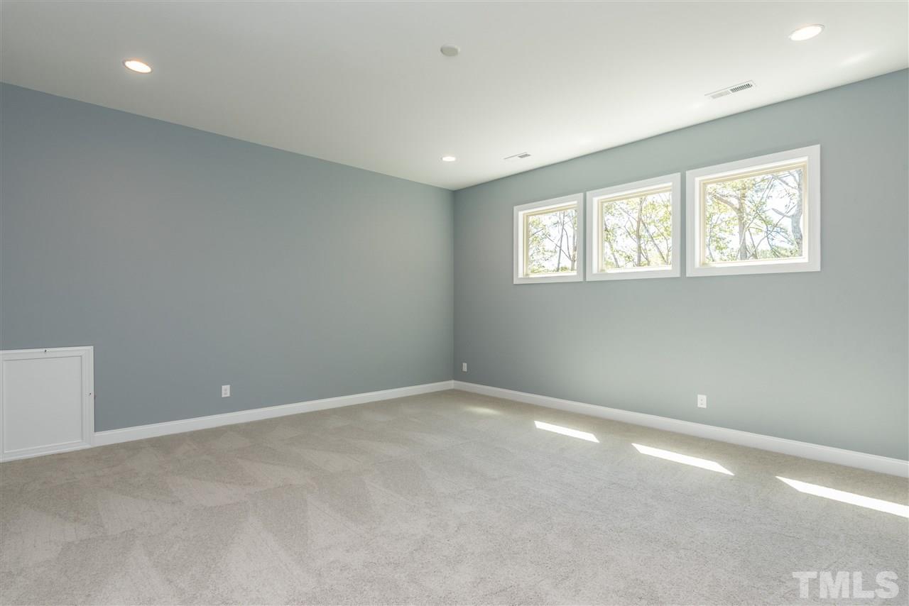 5273 Aleppo Lane, Unit 5 Raleigh, NC 27613 - Photo 14 of 24 a view of an empty room with a window