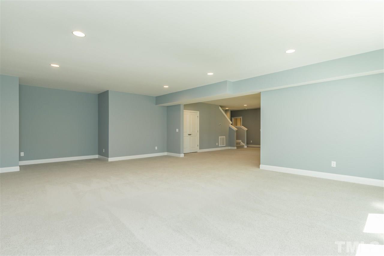 5273 Aleppo Lane, Unit 5 Raleigh, NC 27613 - Photo 18 of 24 an empty room with an entrance and door