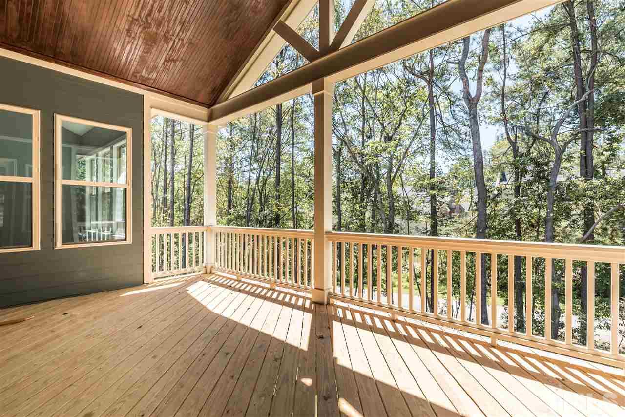 5273 Aleppo Lane, Unit 5 Raleigh, NC 27613 - Photo 20 of 24 a view of a wooden deck