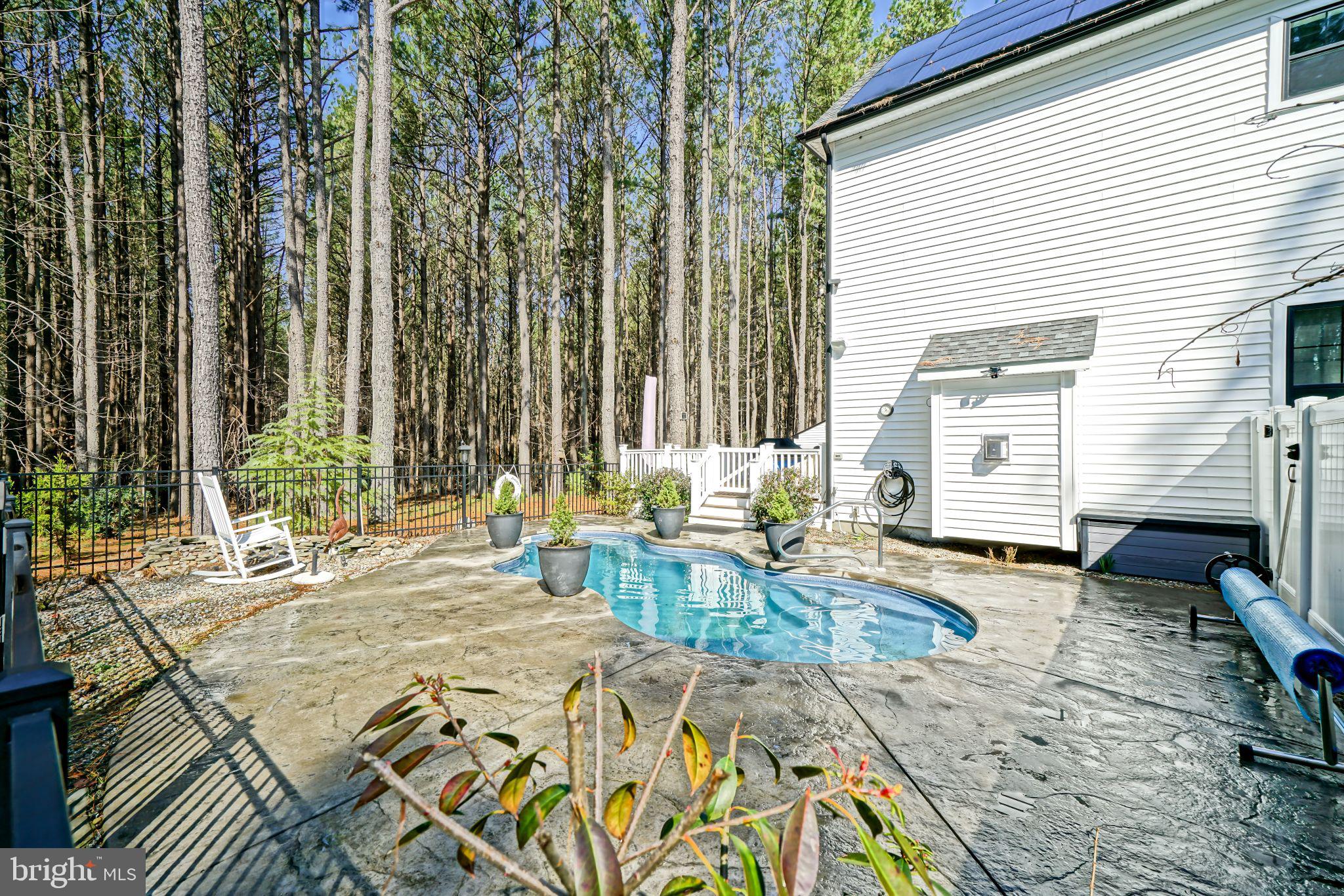 19668 Beaver Dam Road Lewes, DE 19958 - Photo 38 of 50 a view of a backyard with sitting area