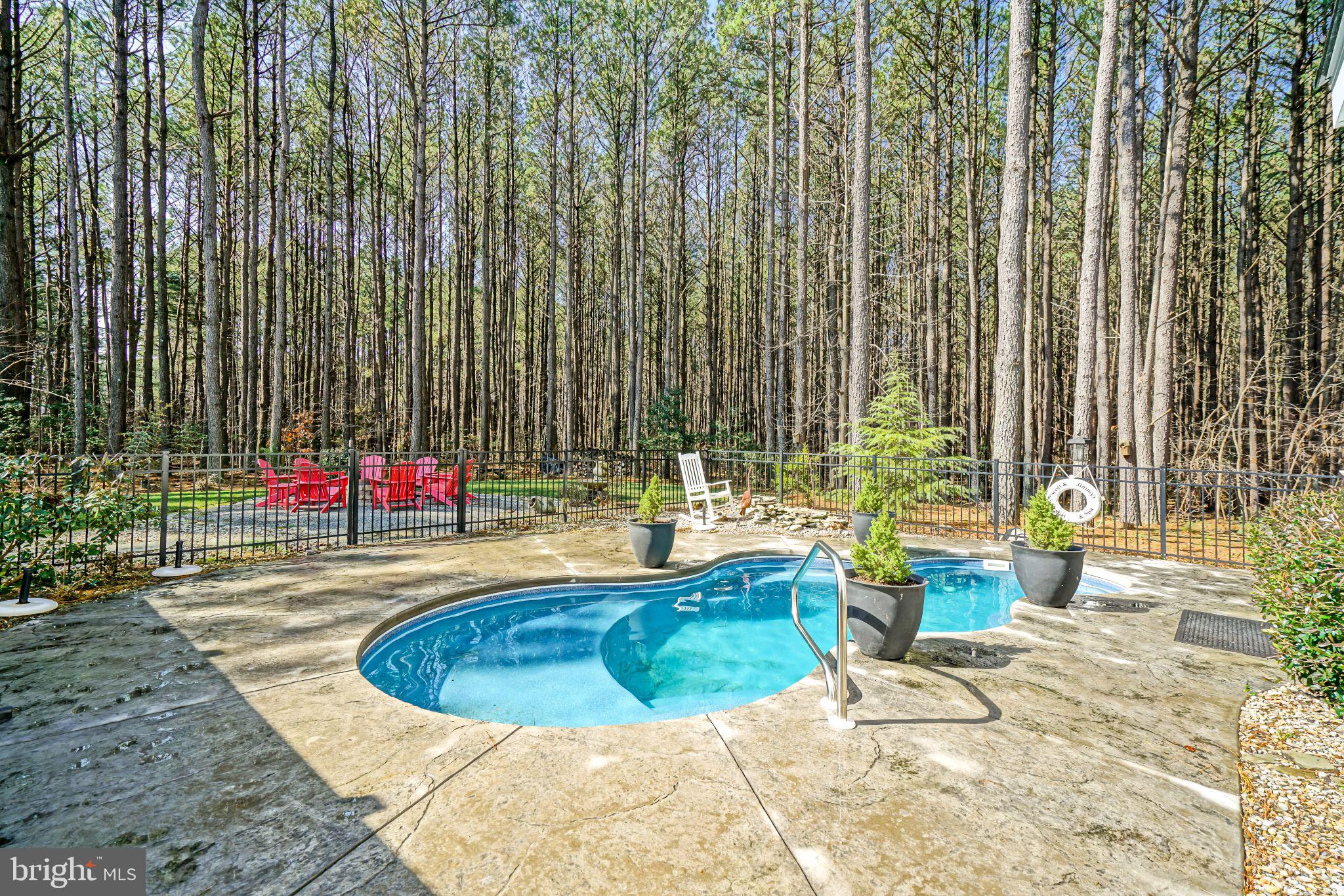 19668 Beaver Dam Road Lewes, DE 19958 - Photo 39 of 50 a view of swimming pool with seating space