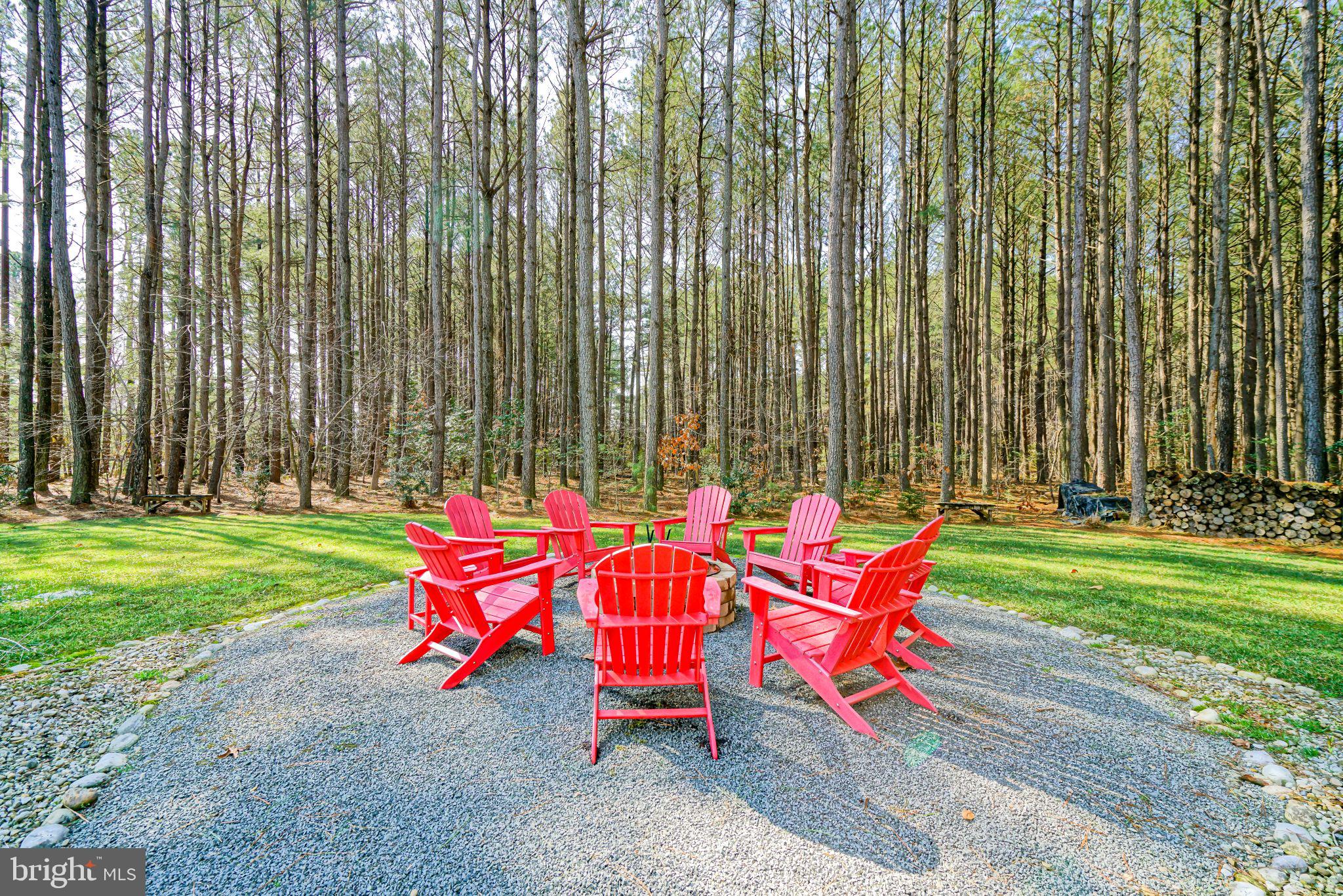 19668 Beaver Dam Road Lewes, DE 19958 - Photo 41 of 50 an outdoor sitting area with couch and garden view