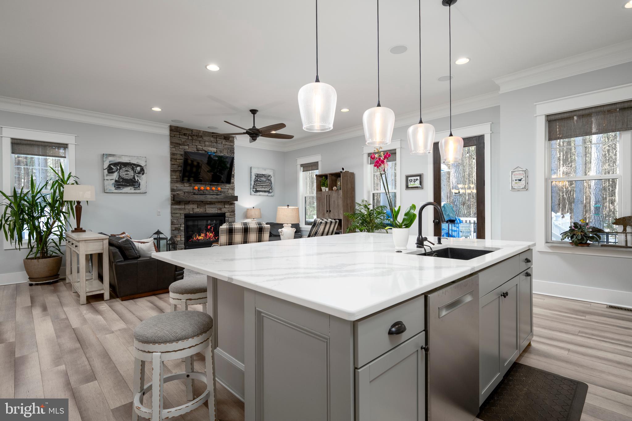19668 Beaver Dam Road Lewes, DE 19958 - Photo 7 of 50 a large kitchen with a table and chairs