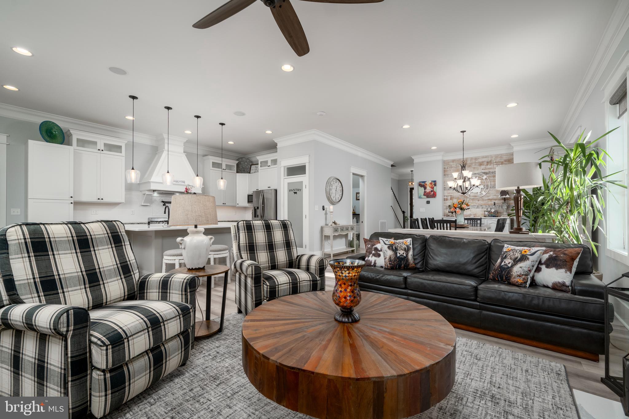19668 Beaver Dam Road Lewes, DE 19958 - Photo 10 of 50 a living room with furniture and a wooden floor