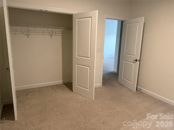 an empty room with closet