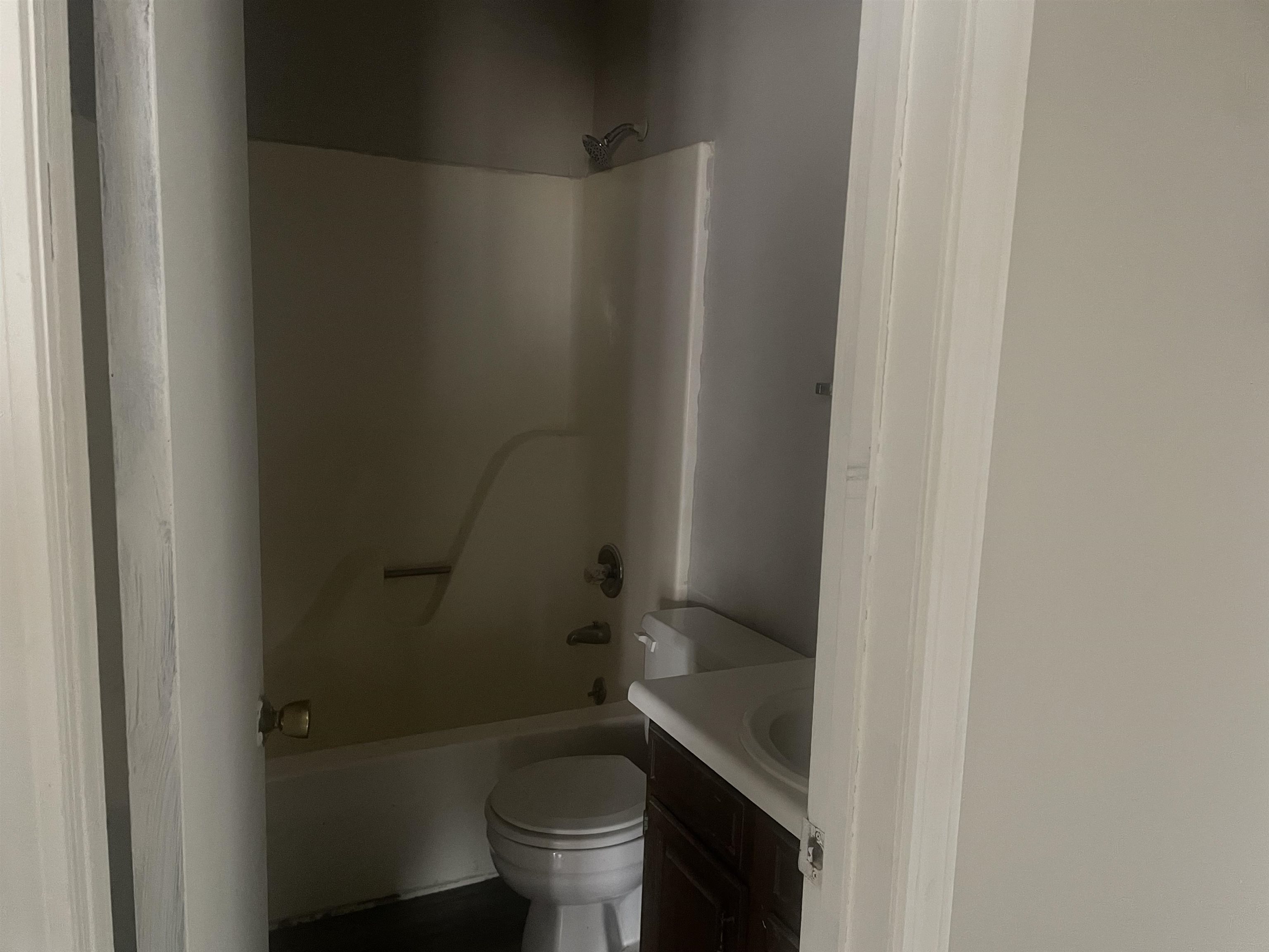 54 Cinnamon Drive Jackson, TN 38305 - Photo 4 of 7 a bathroom with a granite countertop toilet and a sink