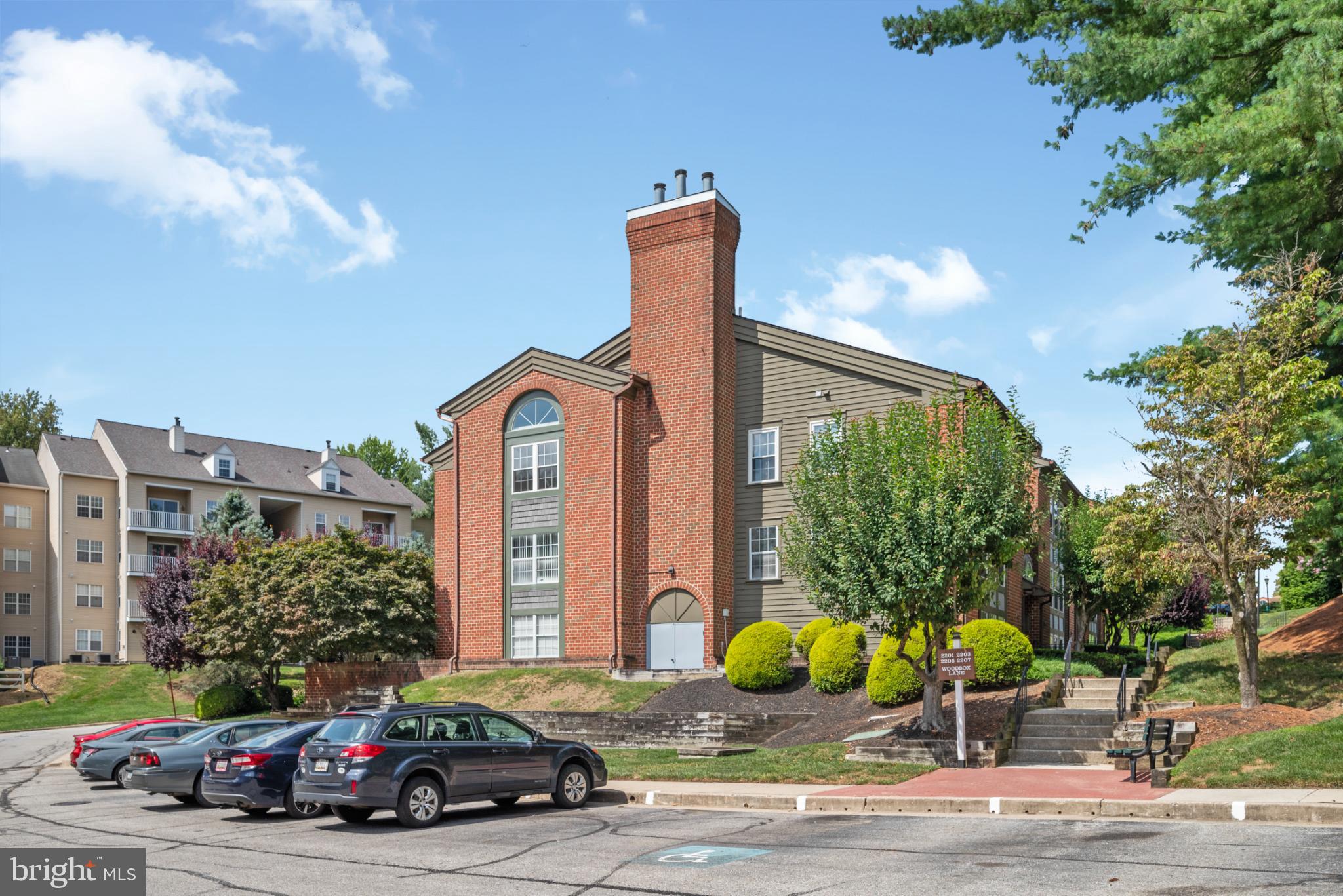 2201 Woodbox Lane, Unit 2201B Baltimore, MD 21209 - Photo 1 of 45 a car parked in front of a building