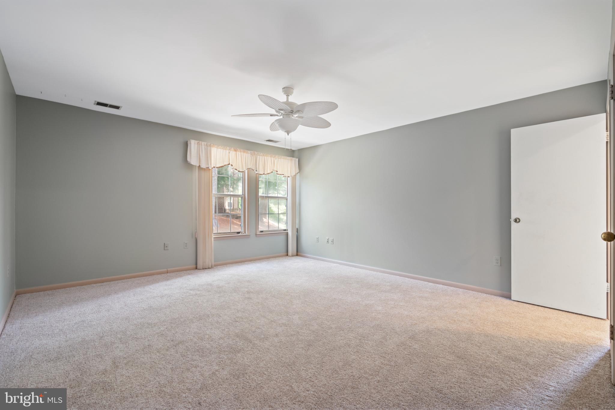 2201 Woodbox Lane, Unit 2201B Baltimore, MD 21209 - Photo 39 of 45 a view of an empty room with a window