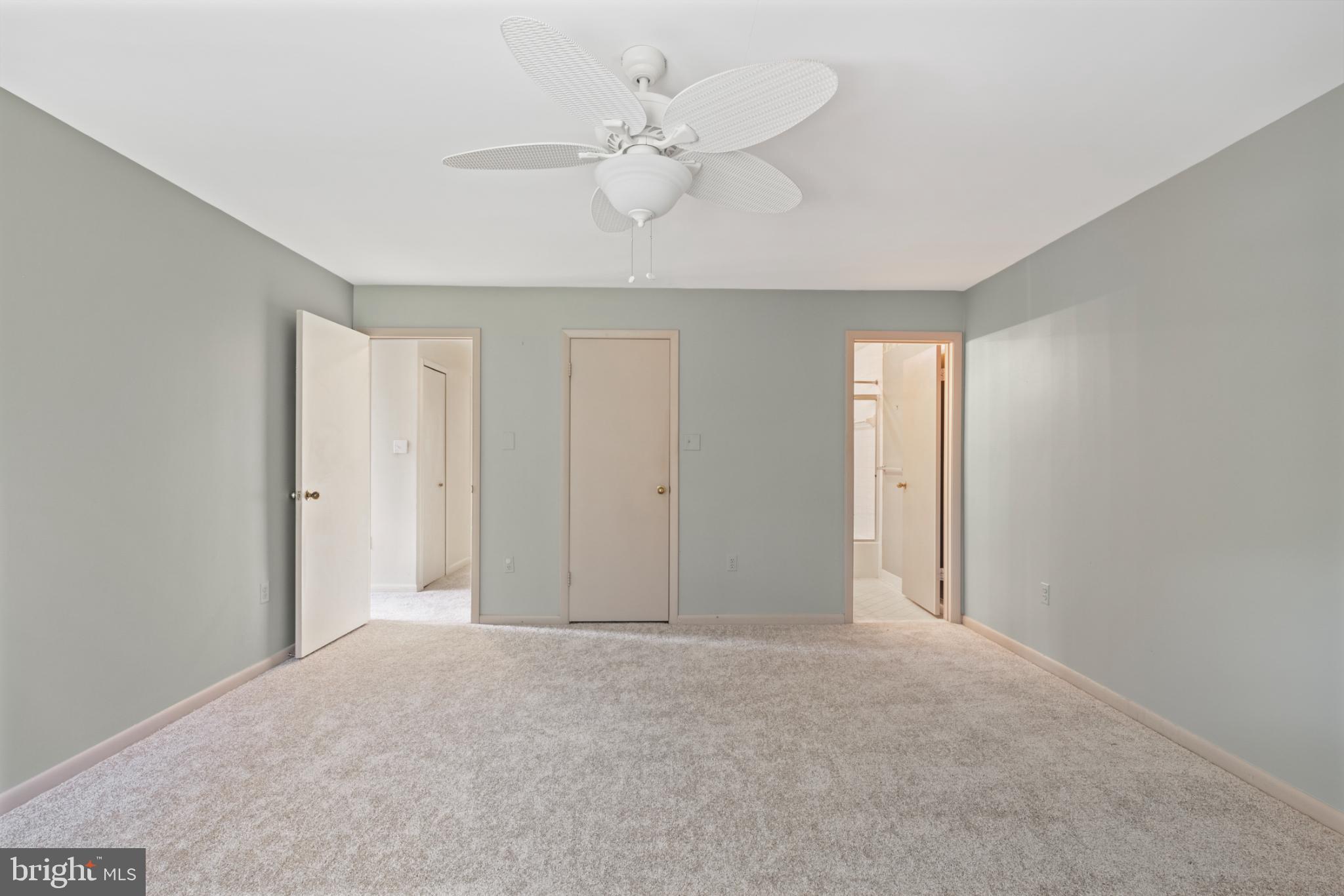 2201 Woodbox Lane, Unit 2201B Baltimore, MD 21209 - Photo 40 of 45 a view of an empty room with a ceiling fan